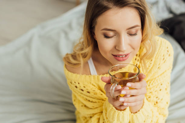 woman drinking collagen tea for radiant skin, collagen for skin, tea with collagen, healthy tea, tea for skin